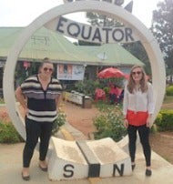 Photo of Kaitlyn Turner at the Equator in Uganda