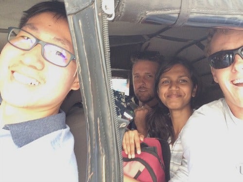 the funguka team smiling in a vehicle