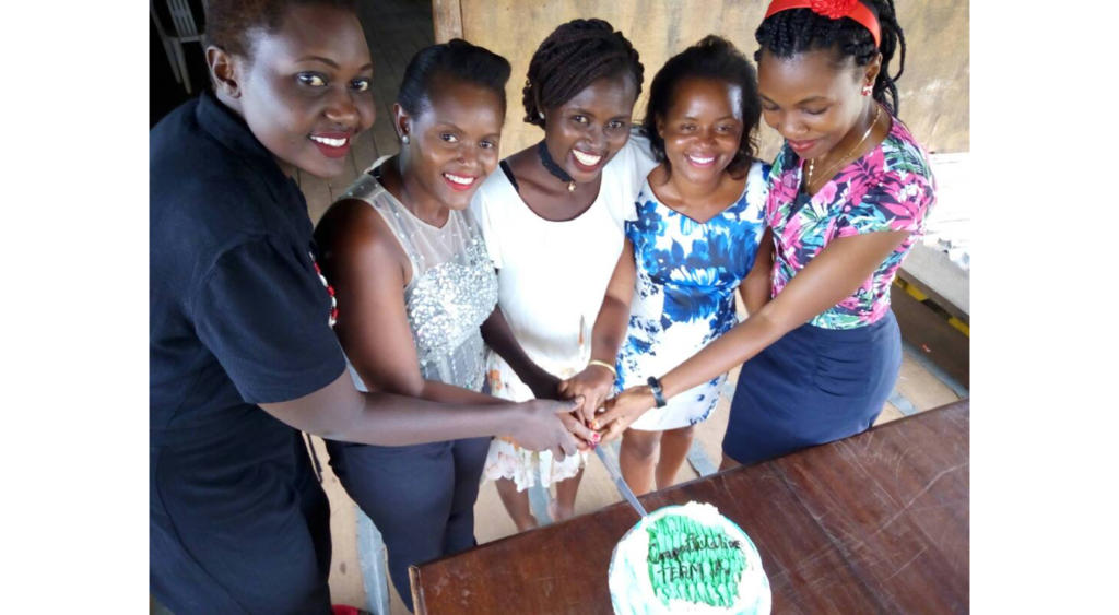 Field team celebrating a birthday with cake
