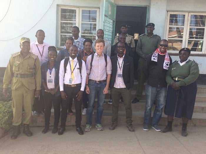 John visiting the Regional Traffic Officer in Mbeya