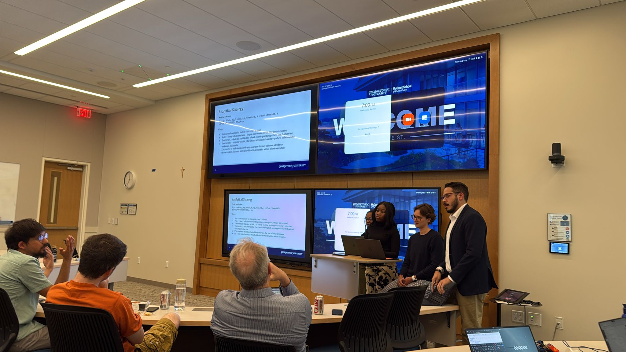 Instructors leading class from front of room